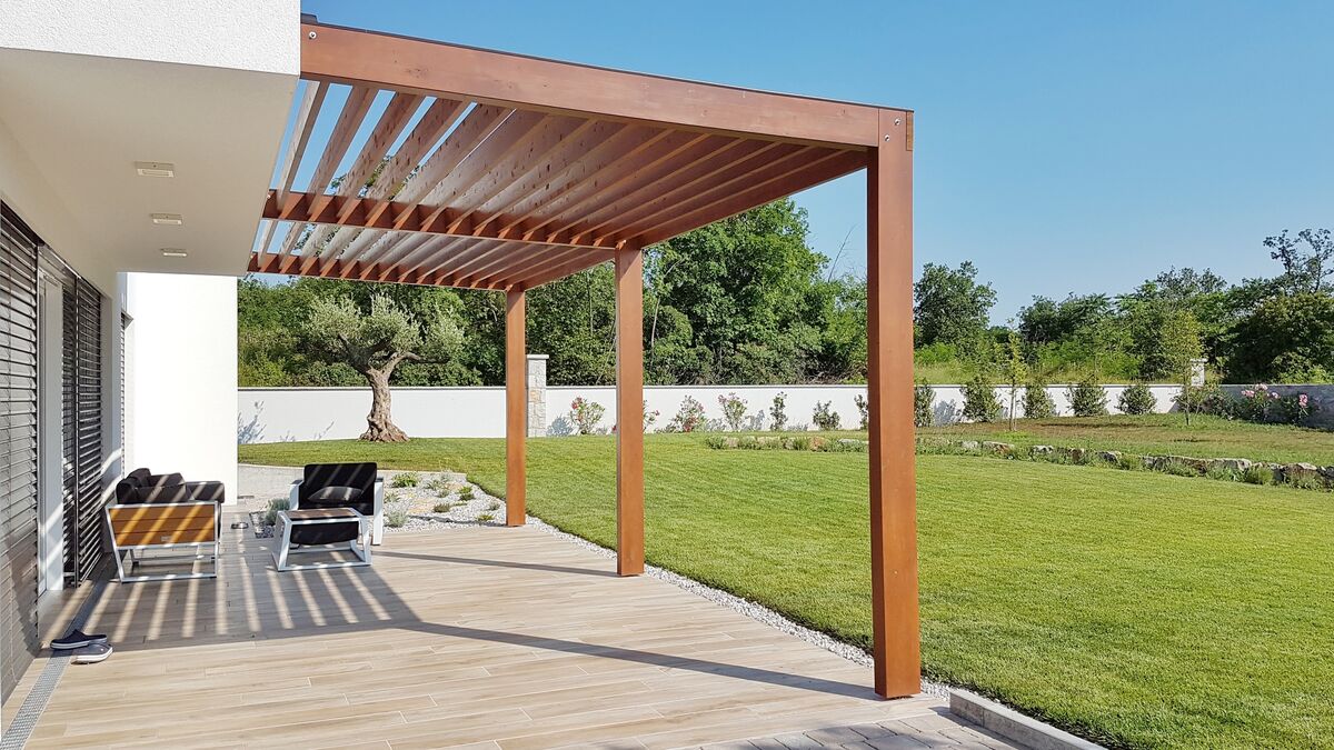 pergola,over,terrace,and,home,garden