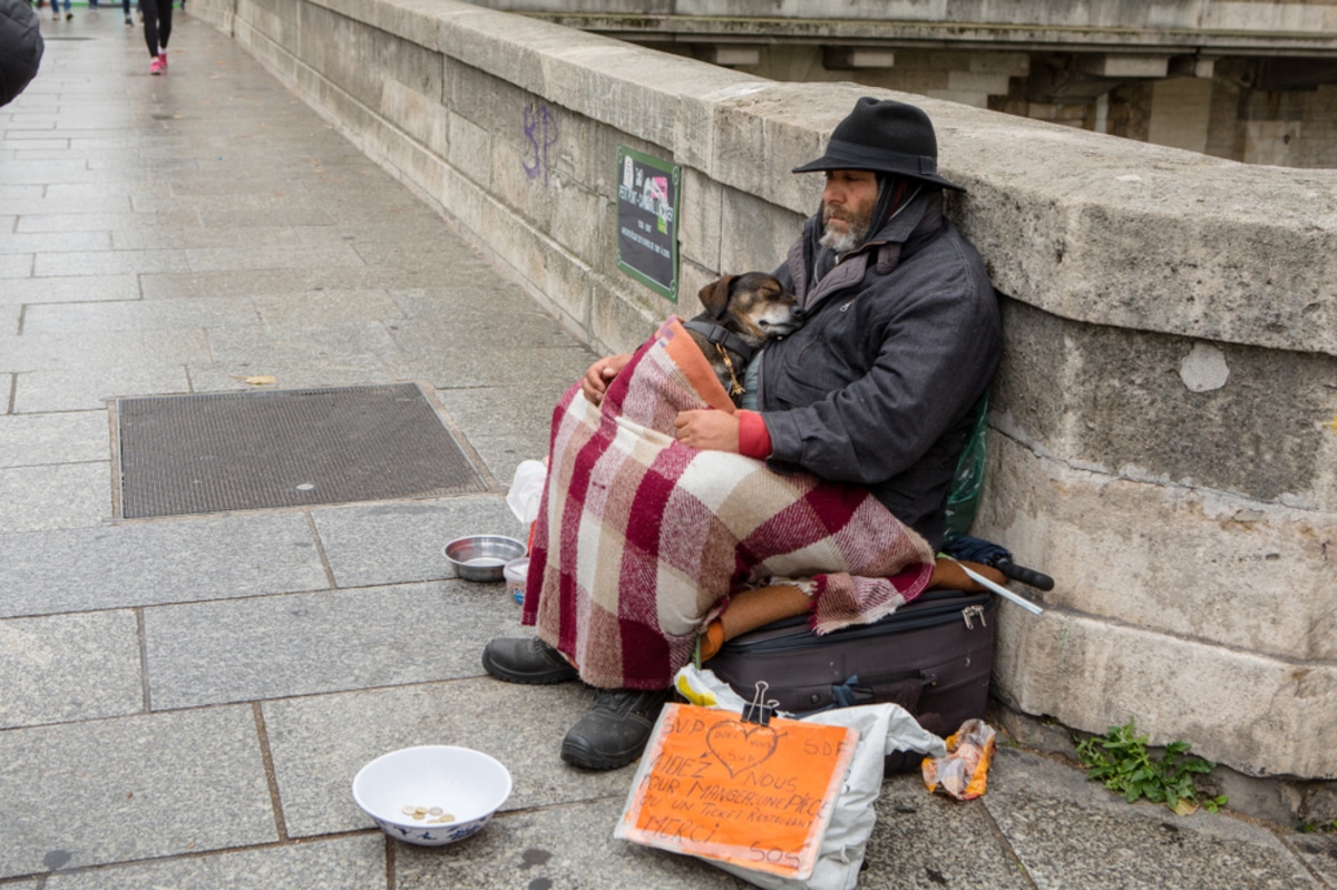 paris,,france, ,october,29,,2017:,a,homeless,man,sits
