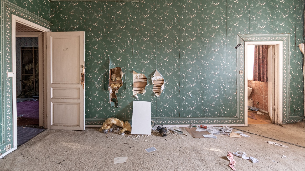 abandoned,castle,,room,with,green,retro,wallpaper
